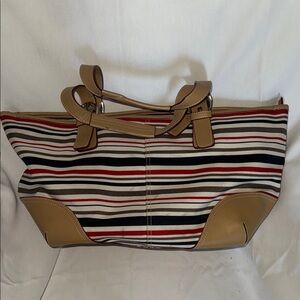 Tan and Black Travel Bag with Striped Pattern and Leather Accents
